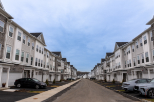 View of townhomes at The Grove by Lennar where we provide 11 month warranty inspection Whippany NJ services.